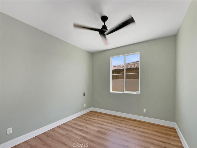 27117 Great Plains Ct, Menifee, CA 92585 - empty room featuring ceiling fan, light wood-style floors, and baseboards