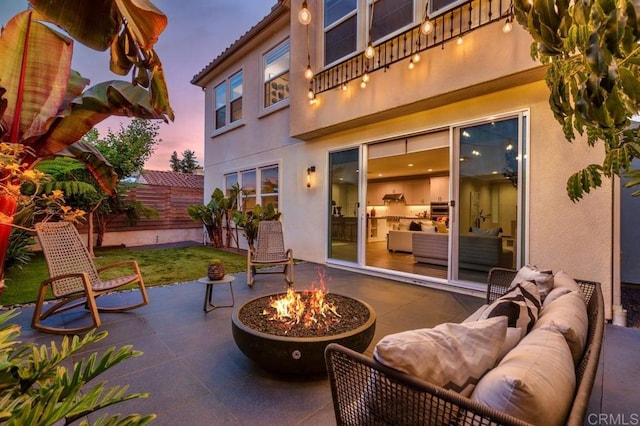 13403 Hudson Ln, San Diego, CA 92130 - view of patio / terrace with an outdoor living space with a fire pit