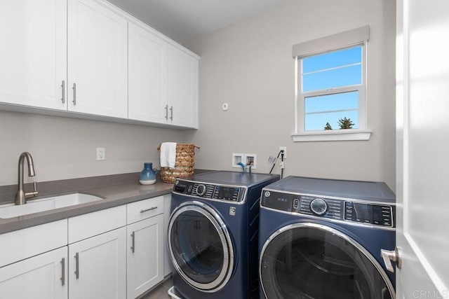 13403 Hudson Ln, San Diego, CA 92130 - laundry room with washer and dryer and cabinet space