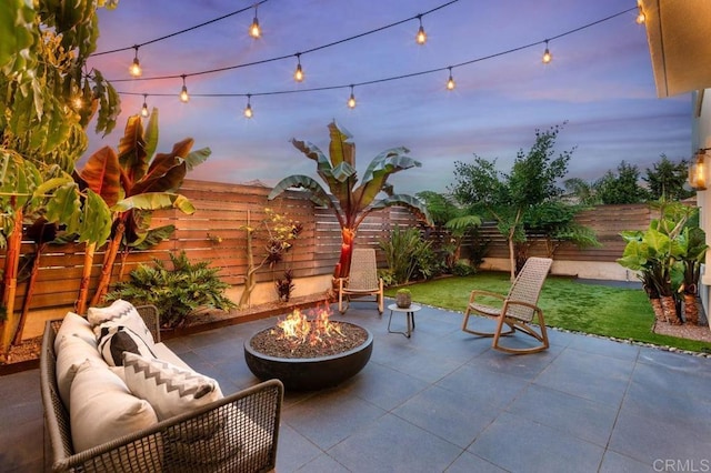 13403 Hudson Ln, San Diego, CA 92130 - fenced backyard featuring a patio and an outdoor living space with a fire pit
