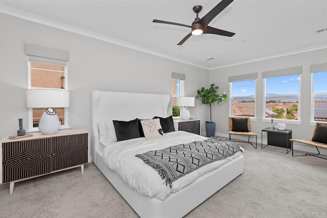 13403 Hudson Ln, San Diego, CA 92130 - bedroom with carpet, crown molding, multiple windows, and a ceiling fan