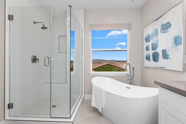 13403 Hudson Ln, San Diego, CA 92130 - full bathroom featuring a stall shower, a soaking tub, and vanity