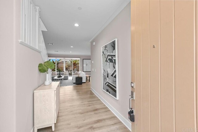 13403 Hudson Ln, San Diego, CA 92130 - hallway with light wood-style flooring and recessed lighting
