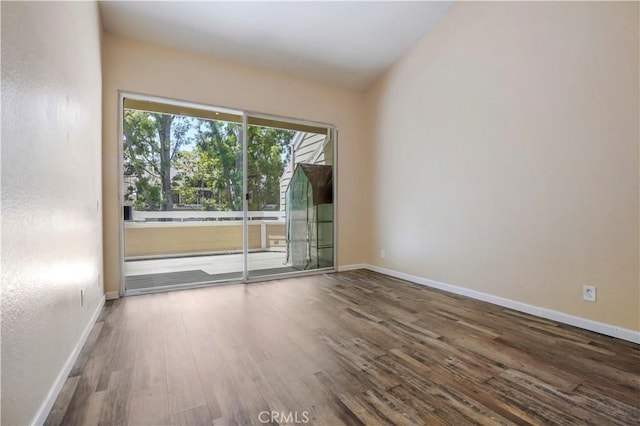 3690 S Bear St Unit 5, Santa Ana, CA 92704 - empty room with wood finished floors and baseboards