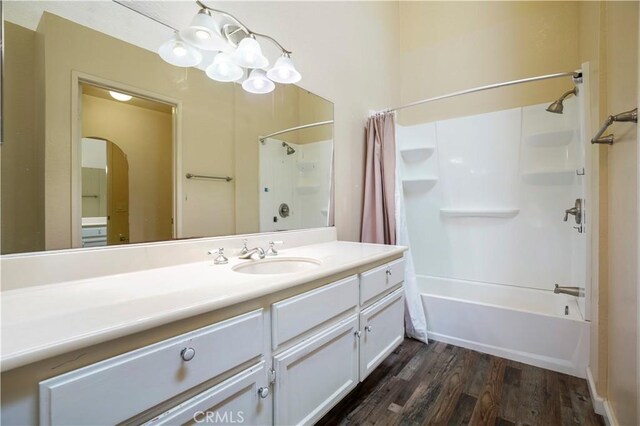 3690 S Bear St Unit 5, Santa Ana, CA 92704 - full bathroom with wood finished floors, shower / bath combination with curtain, and vanity