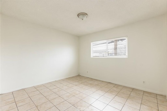 1437 S Gaffey St, San Pedro, CA 90731 - spare room with light tile patterned floors