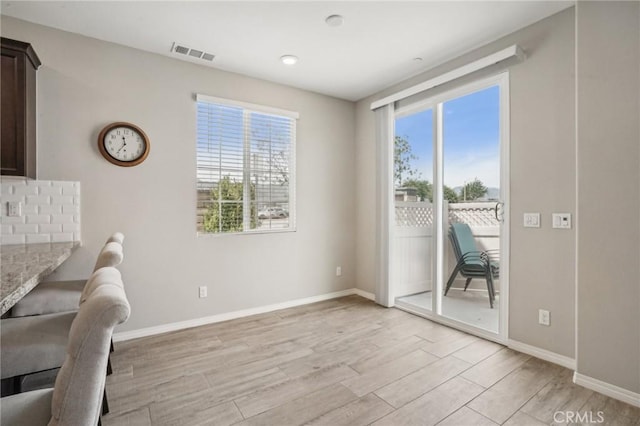 24117 Dolcetto Ave Unit 104, Murrieta, CA 92562 - unfurnished room with light wood-type flooring and baseboards