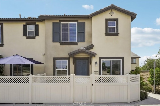 24117 Dolcetto Ave Unit 104, Murrieta, CA 92562 - view of front facade featuring stucco siding