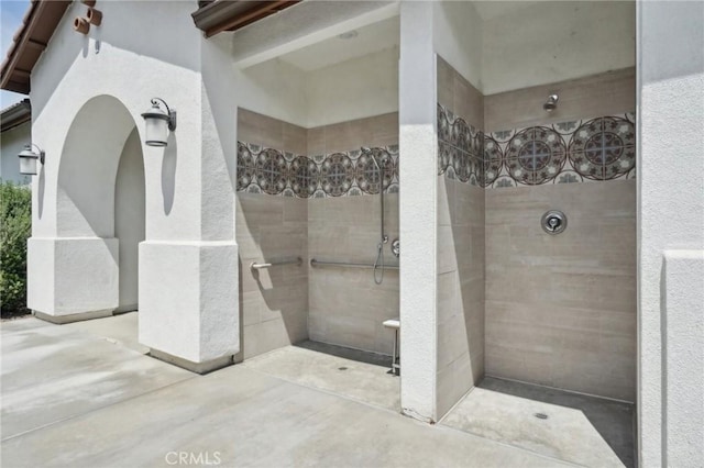 24117 Dolcetto Ave Unit 104, Murrieta, CA 92562 - bathroom with a walk in shower and concrete flooring