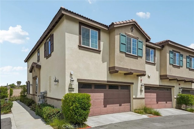 24117 Dolcetto Ave Unit 104, Murrieta, CA 92562 - multi unit property with stucco siding, a garage, and a tiled roof