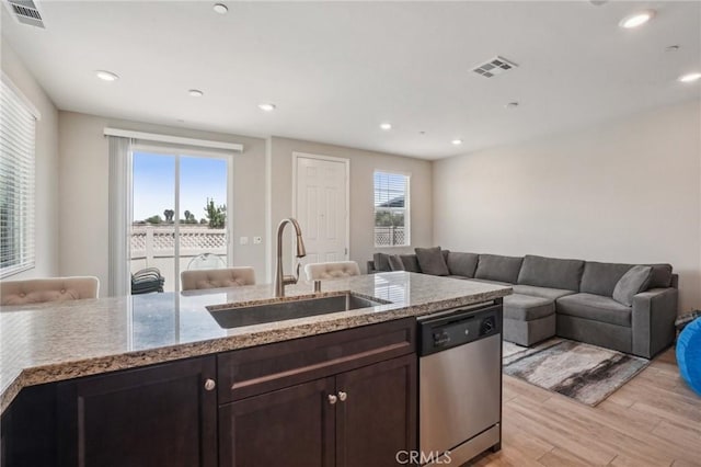24117 Dolcetto Ave Unit 104, Murrieta, CA 92562 - kitchen featuring stainless steel dishwasher, open floor plan, a sink, light wood-style flooring, and recessed lighting