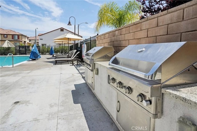 24117 Dolcetto Ave Unit 104, Murrieta, CA 92562 - view of patio featuring a community pool