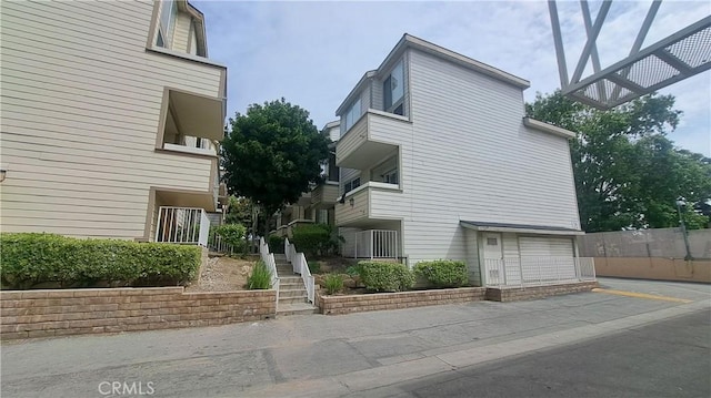 11150 Glenoaks Blvd Unit 106, Pacoima, CA 91331 - view of home's exterior with stairway