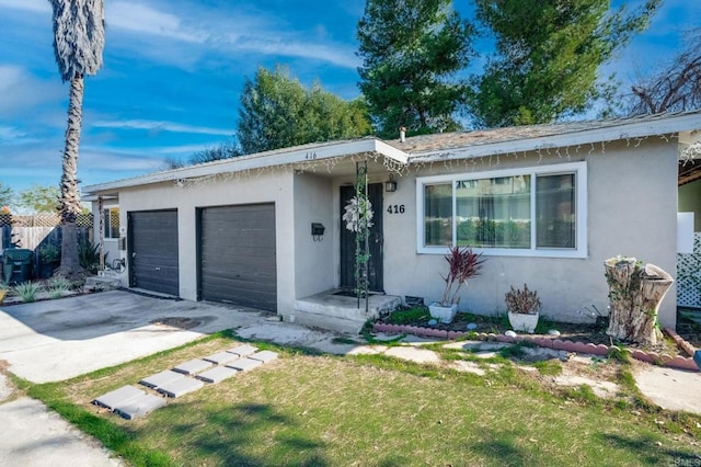 40626 S Grape St, Escondido, CA 92025 - view of front of property with stucco siding, an attached garage, driveway, and a front yard