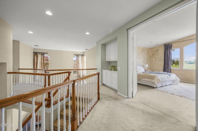 741 Sterling Hills Dr, Camarillo, CA 93010 - hallway featuring light carpet, an upstairs landing, recessed lighting, and baseboards