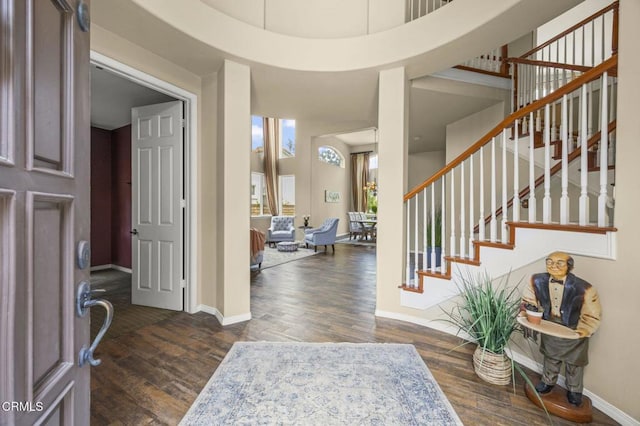 741 Sterling Hills Dr, Camarillo, CA 93010 - foyer with dark wood-style floors, baseboards, and stairs