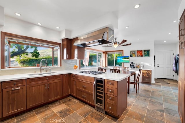1180 Calle Pecos, Thousand Oaks, CA 91360 - kitchen with a sink, wine cooler, healthy amount of natural light, stone tile flooring, and recessed lighting