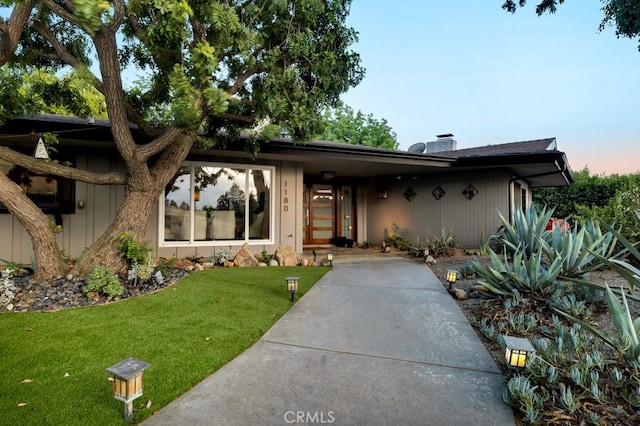 1180 Calle Pecos, Thousand Oaks, CA 91360 - mid-century home featuring a front yard and a chimney