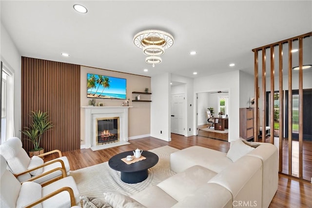 22621 Ridge Line Rd, Diamond Bar, CA 91765 - living area featuring recessed lighting, wood finished floors, a glass covered fireplace, baseboards, and a chandelier