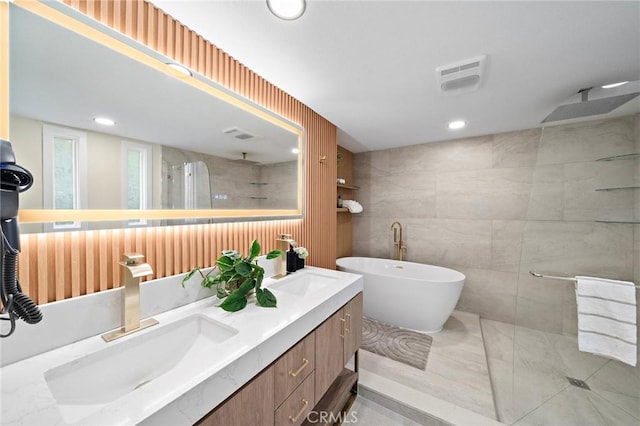 22621 Ridge Line Rd, Diamond Bar, CA 91765 - bathroom featuring walk in shower, double vanity, a freestanding tub, recessed lighting, and tile walls