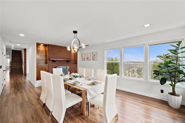 22621 Ridge Line Rd, Diamond Bar, CA 91765 - dining area with baseboards, wood finished floors, stairway, recessed lighting, and a chandelier