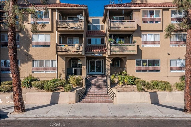 14819 Downey Ave Unit 121, Paramount, CA 90723 - view of apartment building / complex with stairway
