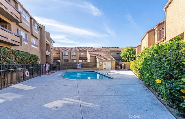 14819 Downey Ave Unit 121, Paramount, CA 90723 - community pool with a patio and a residential view