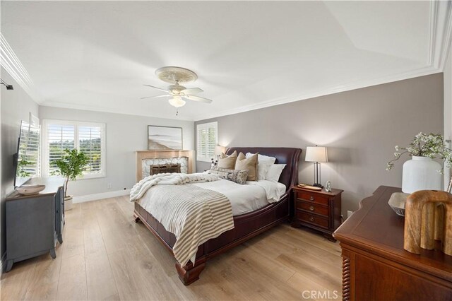 21035 Timber Ridge Rd, Yorba Linda, CA 92886 - bedroom with multiple windows, ornamental molding, light wood finished floors, and ceiling fan