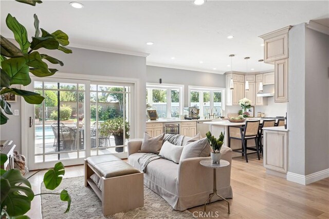 21035 Timber Ridge Rd, Yorba Linda, CA 92886 - living room featuring beverage cooler, recessed lighting, light wood finished floors, and ornamental molding