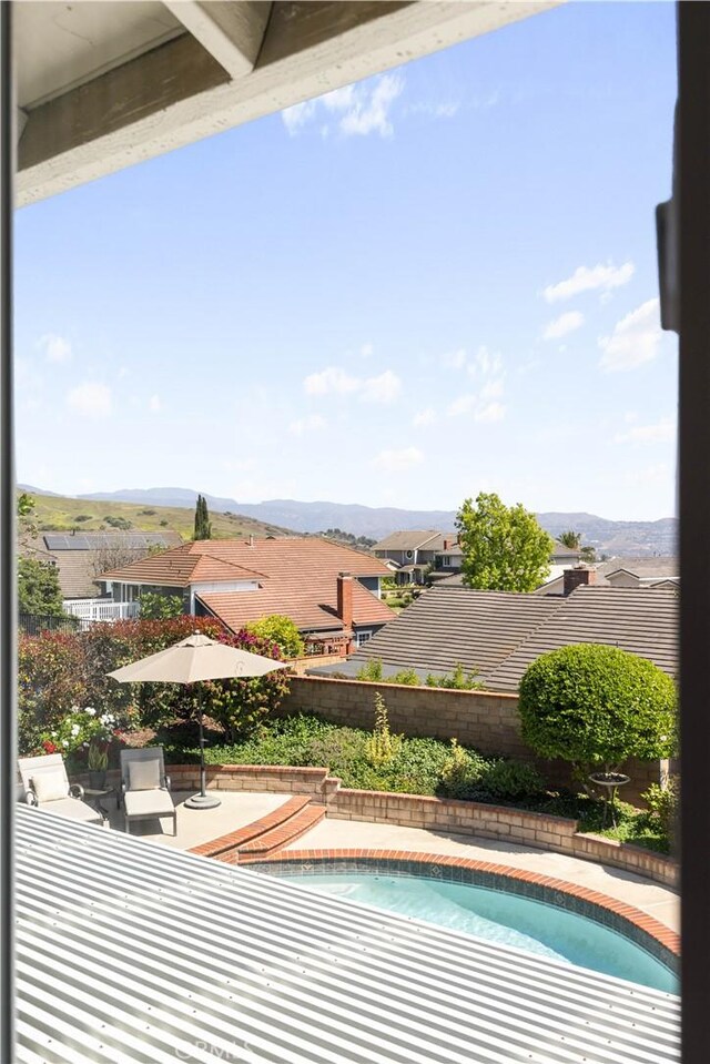 21035 Timber Ridge Rd, Yorba Linda, CA 92886 - outdoor pool featuring a fenced backyard, a patio area, and a mountain view