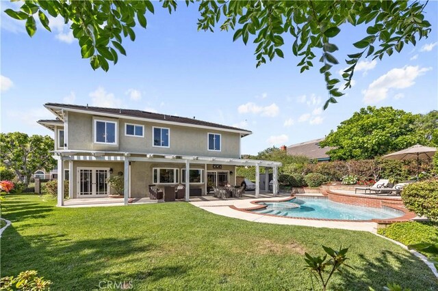 21035 Timber Ridge Rd, Yorba Linda, CA 92886 - rear view of house featuring a pergola, a lawn, a patio, and stucco siding