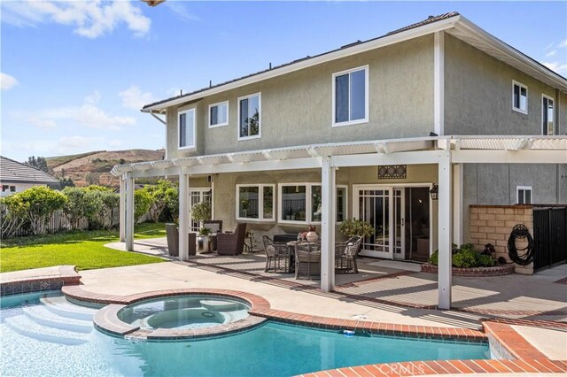 21035 Timber Ridge Rd, Yorba Linda, CA 92886 - back of house featuring a pergola, stucco siding, and a patio