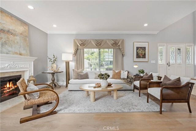 21035 Timber Ridge Rd, Yorba Linda, CA 92886 - living area with a fireplace, plenty of natural light, wood finished floors, ornamental molding, and recessed lighting