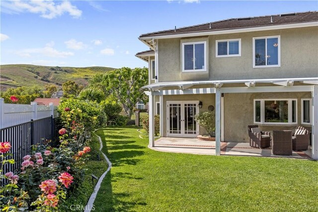 21035 Timber Ridge Rd, Yorba Linda, CA 92886 - rear view of house featuring a pergola, stucco siding, a patio area, french doors, and a mountain view