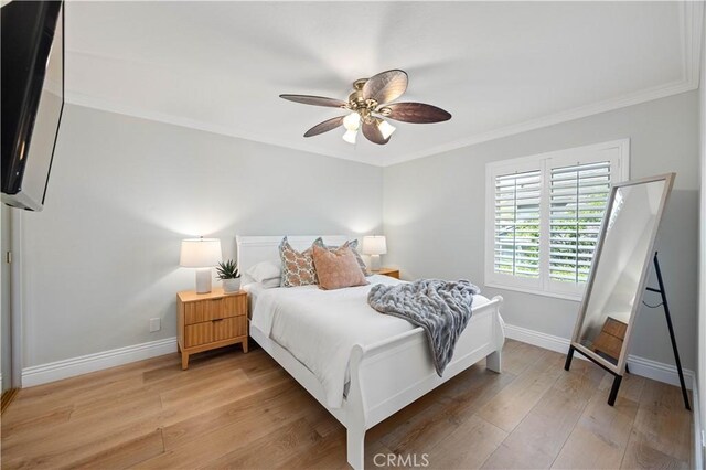 21035 Timber Ridge Rd, Yorba Linda, CA 92886 - bedroom with ornamental molding, light wood-type flooring, and a ceiling fan