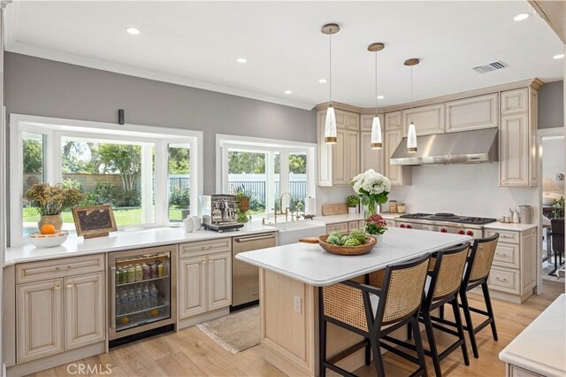 21035 Timber Ridge Rd, Yorba Linda, CA 92886 - kitchen featuring beverage cooler, under cabinet range hood, stainless steel appliances, light countertops, and a center island