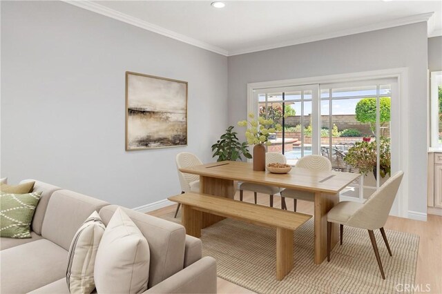 21035 Timber Ridge Rd, Yorba Linda, CA 92886 - dining area featuring light wood-style floors, crown molding, and recessed lighting