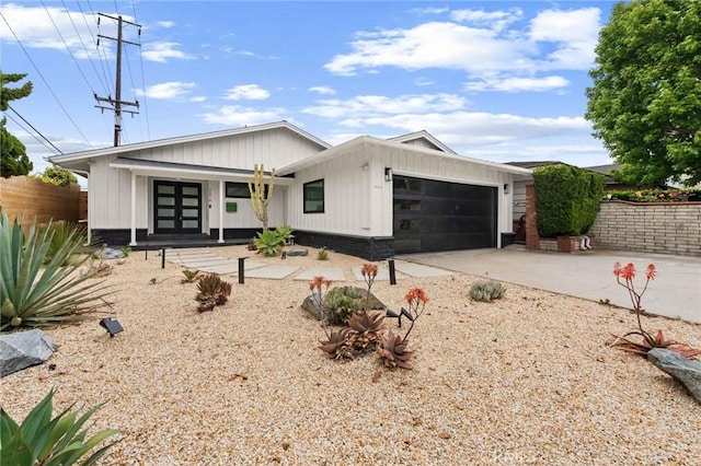 2416 Palm Ave, Manhattan Beach, CA 90266 - view of front of property with an attached garage and driveway