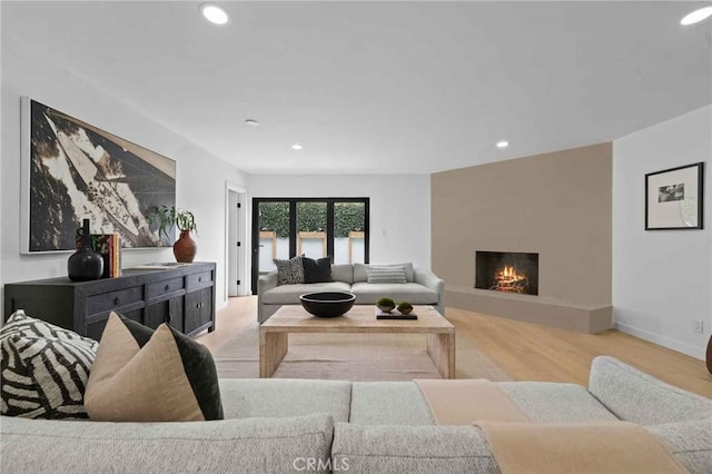 2416 Palm Ave, Manhattan Beach, CA 90266 - living area with recessed lighting, a fireplace, wood finished floors, and baseboards