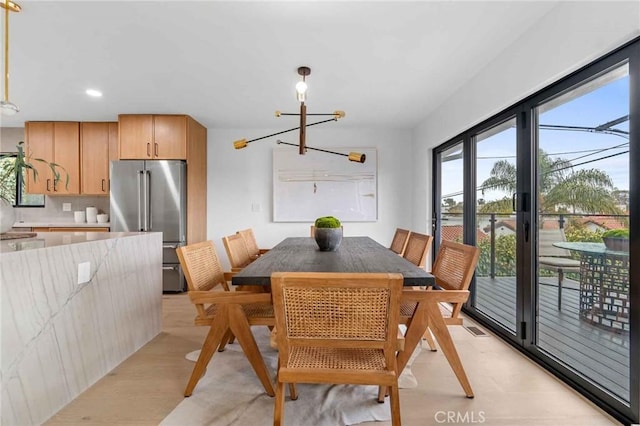 2416 Palm Ave, Manhattan Beach, CA 90266 - dining area with a chandelier and recessed lighting