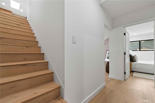 2416 Palm Ave, Manhattan Beach, CA 90266 - stairway with hardwood / wood-style floors, recessed lighting, and baseboards