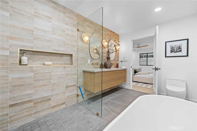 2416 Palm Ave, Manhattan Beach, CA 90266 - ensuite bathroom with a soaking tub, double vanity, recessed lighting, toilet, and tiled shower