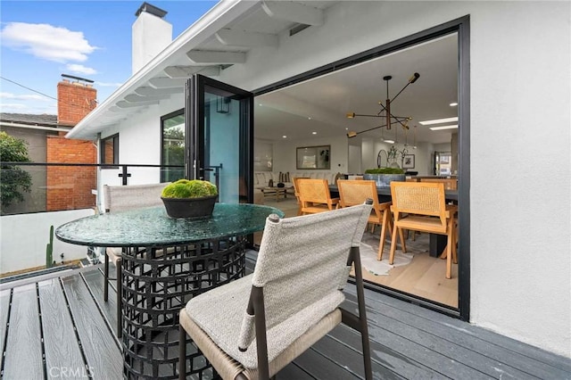 2416 Palm Ave, Manhattan Beach, CA 90266 - wooden terrace with outdoor dining area