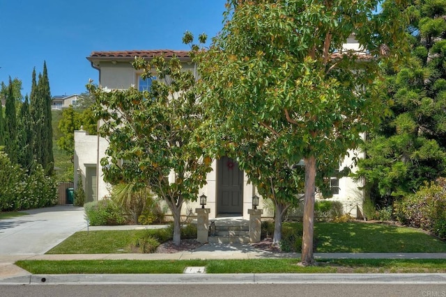 3518 Camino Cereza, Carlsbad, CA 92009 - view of front of house with stucco siding and concrete driveway