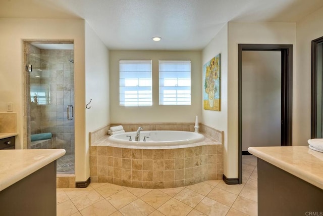 3518 Camino Cereza, Carlsbad, CA 92009 - bathroom featuring tile patterned flooring, a garden tub, a shower stall, and vanity