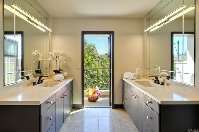 3518 Camino Cereza, Carlsbad, CA 92009 - bathroom featuring two vanities, healthy amount of natural light, and tile patterned flooring