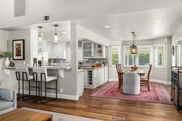 6 Stansbury Ct, Chico, CA 95928 - dining area with dark wood-style flooring, baseboards, and recessed lighting