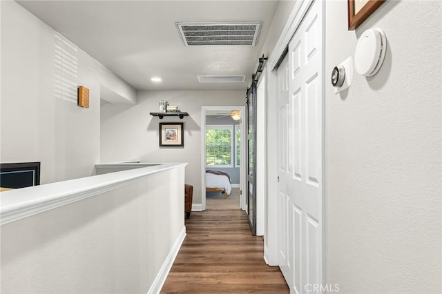6 Stansbury Ct, Chico, CA 95928 - hallway featuring baseboards, dark wood-type flooring, and recessed lighting
