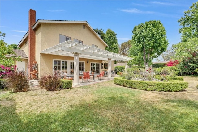 6232 E Shenandoah Ave, Orange, CA 92867 - back of property with a pergola, stucco siding, a chimney, a yard, and a patio area