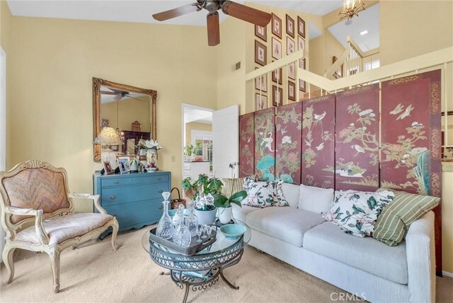 6232 E Shenandoah Ave, Orange, CA 92867 - living room with carpet floors, ceiling fan, a high ceiling, and plenty of natural light